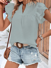 Thalia | Top con escote en V y volantes